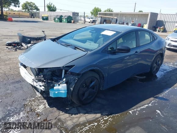 ✅ 2024 Toyota Prius LE • VIN: JTDADABU9R3022198 • Lot: 43122047. Listed on IAAI with 18,714 mi. Free auction sales archive from the USA and detailed vehicle history report at DreamBid. Image 2.