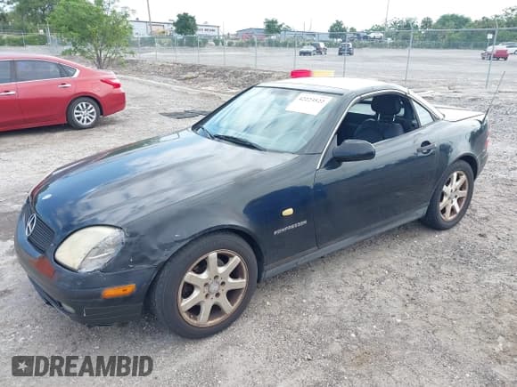 ✅ 1999 Mercedes-Benz SLK 230/320 • VIN: WDBKK47F0XF086064 • Lot: 42223522. Wystawiony na IAAI z przebiegiem 166 381 mil. Bezpłatny archiwum sprzedaży aukcyjnych z USA i szczegółowy raport historii pojazdu na DreamBid. Zdjęcie 2.