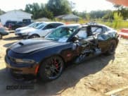 ✅ 2020 Dodge Charger Scat Pack • VIN: 2C3CDXGJ0LH157606 • Lot: 43160897. Listed on IAAI with 96,331 mi. Free auction sales archive from the USA and detailed vehicle history report at DreamBid. Image 2.