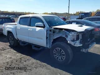 ✅ 2023 Toyota Tacoma Trail Edition • VIN: 3TYCZ5AN5PT163040 • Лот: 43493597. Опубликован ранее на IAAI с пробегом 8 285 миль. Бесплатный доступ к архиву аукционных продаж из США и подробный отчёт об истории автомобиля на DreamBid. Изображение 1.