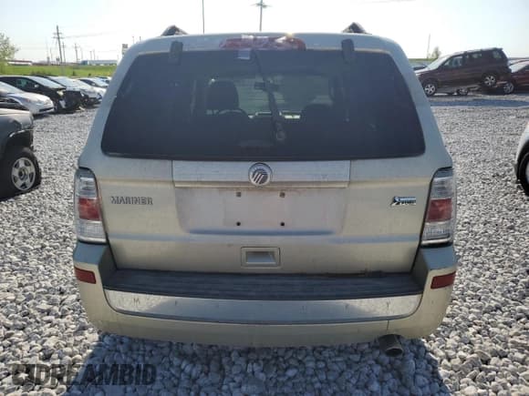 ✅ 2010 Mercury Mariner • VIN: 4M2CN9BG5AKJ11799 • Lot: 46441995. Listed on Copart with 125,871 mi. Free auction sales archive from the USA and detailed vehicle history report at DreamBid. Image 6.