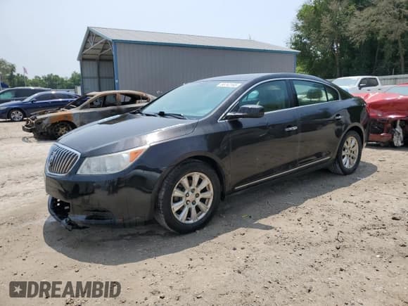 ✅ 2013 Buick LaCrosse • VIN: 1G4GA5ER6DF284927 • Lot: 58742165. Listed on Copart with 134,629 mi. Free auction sales archive from the USA and detailed vehicle history report at DreamBid. Image 1.