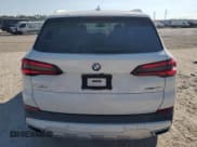 ✅ 2021 BMW X5 sDrive40i • VIN: 5UXCR4C0XM9H39546 • Лот: 87043045. Опубликован ранее на Copart с пробегом 109 781 миль. Бесплатный доступ к архиву аукционных продаж из США и подробный отчёт об истории автомобиля на DreamBid. Изображение 6.