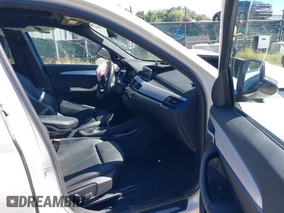 ✅ 2021 BMW X1 xDrive28i • VIN: WBXJG9C09M5T58600 • Lot: 43174957. Listed on IAAI with 49,000 mi. Free auction sales archive from the USA and detailed vehicle history report at DreamBid. Image 5.