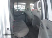 ✅ 2009 Nissan Frontier SE • VIN: 1N6AD07U59C405247 • Lot: 42821636. Wystawiony na IAAI z przebiegiem 164 946 mil. Bezpłatny archiwum sprzedaży aukcyjnych z USA i szczegółowy raport historii pojazdu na DreamBid. Zdjęcie 7.