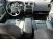 2005 Dodge Dakota Laramie with VIN 1D7HE58N35S224298, listed as a Copart auction lot 70650524 with 179,946 mi miles and Salvage title. Bid and sale history available at DreamBid. Image 8.