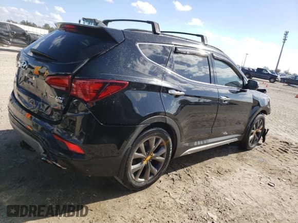 ✅ 2018 Hyundai Santa Fe Ultimate • VIN: 5XYZW4LA2JG543332 • Лот: 38692323. Опубликован ранее на Copart с пробегом 95 618 миль. Бесплатный доступ к архиву аукционных продаж из США и подробный отчёт об истории автомобиля на DreamBid. Изображение 3.
