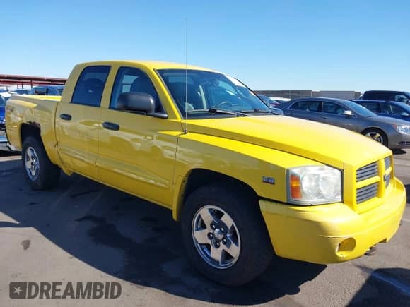 2006 Dodge Dakota SLT z VIN 1D7HW48J46S584508, wystawiony jako IAAI lot #40732421 z przebiegiem 148 957 mil mil oraz . Historia ofert i sprzedaży dostępna na DreamBid. Obrazek 1.