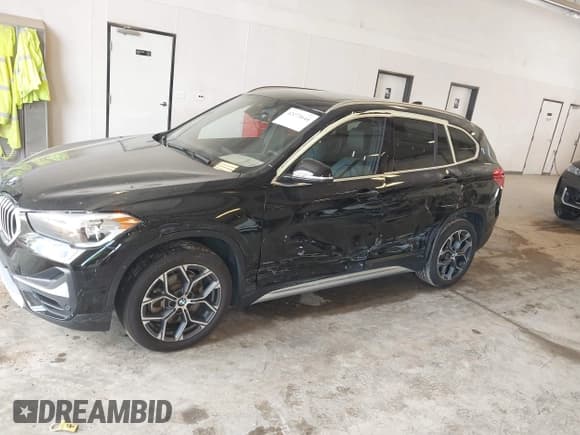 ✅ 2022 BMW X1 xDrive28i • VIN: WBXJG9C09N5U69567 • Lot: 42273644. Listed on IAAI with 36,944 mi. Free auction sales archive from the USA and detailed vehicle history report at DreamBid. Image 6.