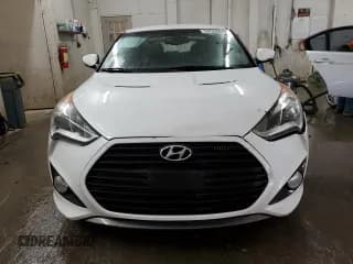 ✅ 2014 Hyundai Veloster Turbo • VIN: KMHTC6AE7EU200967 • Lot: 73729504. Wystawiony na Copart z przebiegiem 160 795 mil. Bezpłatny archiwum sprzedaży aukcyjnych z USA i szczegółowy raport historii pojazdu na DreamBid. Zdjęcie 5.