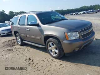 2012 Chevrolet Tahoe LT z VIN 1GNSCBE03CR152690, wystawiony jako IAAI lot #43023058 z przebiegiem 166 314 mil mil oraz . Historia ofert i sprzedaży dostępna na DreamBid. Obrazek 1.