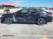 ✅ 2018 Toyota Camry LE • VIN: 4T1B11HK5JU662437 • Lot: 43568869. Listed on IAAI with 118,750 mi. Free auction sales archive from the USA and detailed vehicle history report at DreamBid. Image 14.