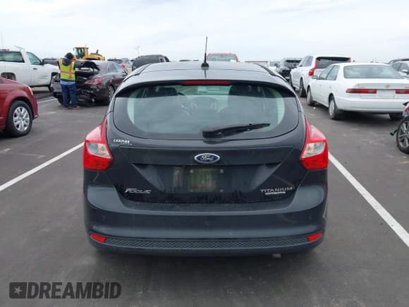 ✅ 2014 Ford Focus Titanium • VIN: 1FADP3N27EL114825 • Lot: 43217005. Listed on IAAI with 148,002 mi. Free auction sales archive from the USA and detailed vehicle history report at DreamBid. Image 16.