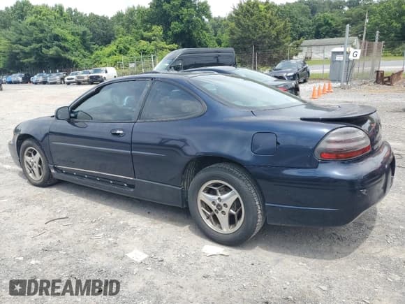 ✅ 2002 Pontiac Grand Prix GT • VIN: 1G2WP12KX2F162720 • Лот: 64205605. Опубликован ранее на Copart с пробегом 181 542 миль. Бесплатный доступ к архиву аукционных продаж из США и подробный отчёт об истории автомобиля на DreamBid. Изображение 2.