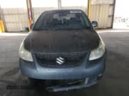 ✅ 2009 Suzuki SX4 Sport FWD • VIN: JS2YC414996202029 • Lot: 44373085. Wystawiony na Copart z przebiegiem 234 545 mil. Bezpłatny archiwum sprzedaży aukcyjnych z USA i szczegółowy raport historii pojazdu na DreamBid. Zdjęcie 5.