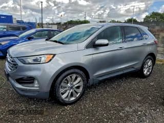 ✅ 2021 Ford Edge Titanium • VIN: 2FMPK4K92MBA08466 • Lot: 94902215. Wystawiony na Copart z przebiegiem 138 809 mil. Bezpłatny archiwum sprzedaży aukcyjnych z USA i szczegółowy raport historii pojazdu na DreamBid. Zdjęcie 1.
