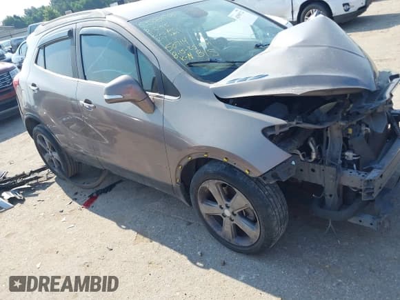 ✅ 2014 Buick Encore Leather • VIN: KL4CJCSB3EB744871 • Лот: 42990722. Опубликован ранее на IAAI с пробегом 136 826 миль. Бесплатный доступ к архиву аукционных продаж из США и подробный отчёт об истории автомобиля на DreamBid. Изображение 1.