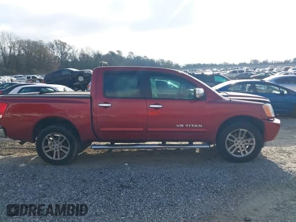 ✅ 2015 Nissan Titan SV • VIN: 1N6BA0ED1FN503871 • Lot: 41491164. Listed on IAAI with 168,793 mi. Free auction sales archive from the USA and detailed vehicle history report at DreamBid. Image 14.