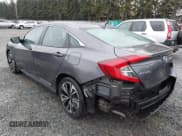 ✅ 2018 Honda Civic EX-L • VIN: 2HGFC1F74JH640836 • Lot: 43597247. Listed on IAAI with 76,137 mi. Free auction sales archive from the USA and detailed vehicle history report at DreamBid. Image 3.