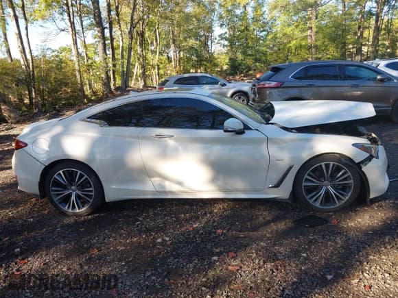 ✅ 2019 Infiniti Q60 Luxe • VIN: JN1EV7ELXKM291107 • Lot: 43461987. Listed on IAAI with 106,661 mi. Free auction sales archive from the USA and detailed vehicle history report at DreamBid. Image 12.