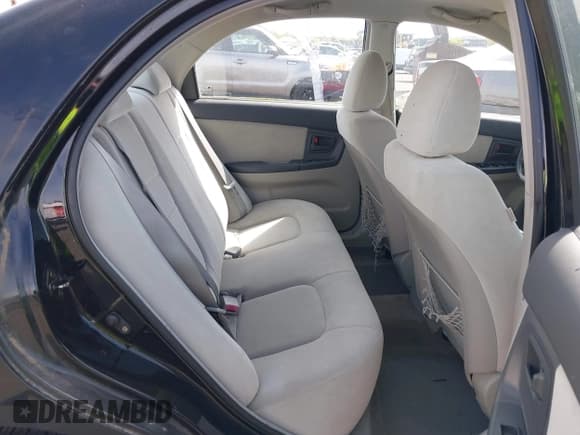 ✅ 2006 Kia Spectra EX • VIN: KNAFE122965304811 • Lot: 41998981. Listed on IAAI with 184,119 mi. Free auction sales archive from the USA and detailed vehicle history report at DreamBid. Image 8.