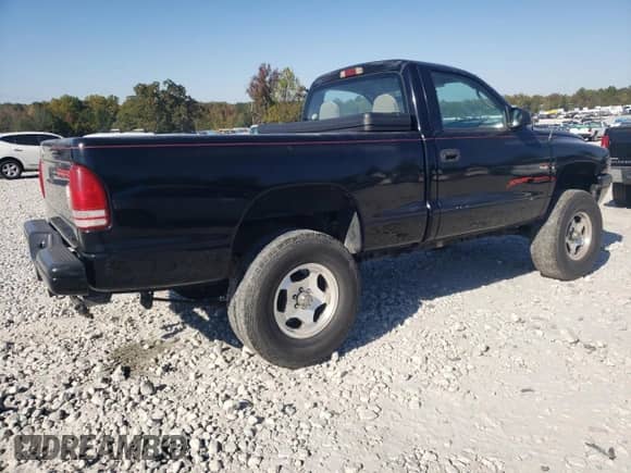 2002 Dodge Dakota Sport z VIN 1B7FL36X42S669287, wystawiony jako Copart lot #77607224 z przebiegiem 112 334 mil mil oraz Czysty tytuł • Clean title. Historia ofert i sprzedaży dostępna na DreamBid. Obrazek 3.