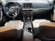 ✅ 2016 Mazda CX-5 Grand Touring • VIN: JM3KE4DY7G0859184 • Lot: 92858065. Wystawiony na Copart z przebiegiem 45 518 mil. Bezpłatny archiwum sprzedaży aukcyjnych z USA i szczegółowy raport historii pojazdu na DreamBid. Zdjęcie 8.