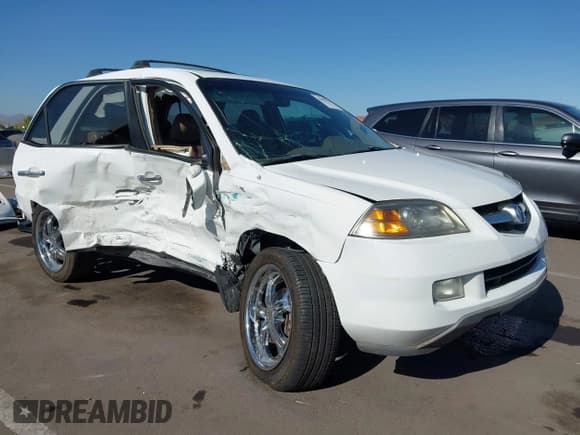 ✅ 2004 Acura MDX Touring • VIN: 2HNYD18844H557819 • Lot: 42855324. Wystawiony na IAAI z przebiegiem 165 576 mil. Bezpłatny archiwum sprzedaży aukcyjnych z USA i szczegółowy raport historii pojazdu na DreamBid. Zdjęcie 1.