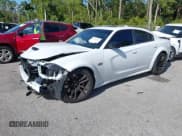 ✅ 2023 Dodge Charger Scat Pack Widebody • VIN: 2C3CDXGJXPH643474 • Лот: 41261253. Опубликован ранее на IAAI с пробегом 9 525 миль. Бесплатный доступ к архиву аукционных продаж из США и подробный отчёт об истории автомобиля на DreamBid. Изображение 2.