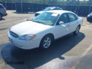 ✅ 2001 Ford Taurus SES • VIN: 1FAFP55U21G266598 • Lot: 43221102. Listed on IAAI with 313,632 mi. Free auction sales archive from the USA and detailed vehicle history report at DreamBid. Image 2.