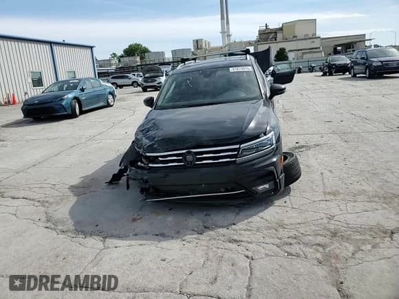 ✅ 2021 Volkswagen Tiguan SEL Premium R-Line • VIN: 3VV4B7AX9MM042512 • Лот: 81874915. Опубликован ранее на Copart с пробегом 43 300 миль. Бесплатный доступ к архиву аукционных продаж из США и подробный отчёт об истории автомобиля на DreamBid. Изображение 15.