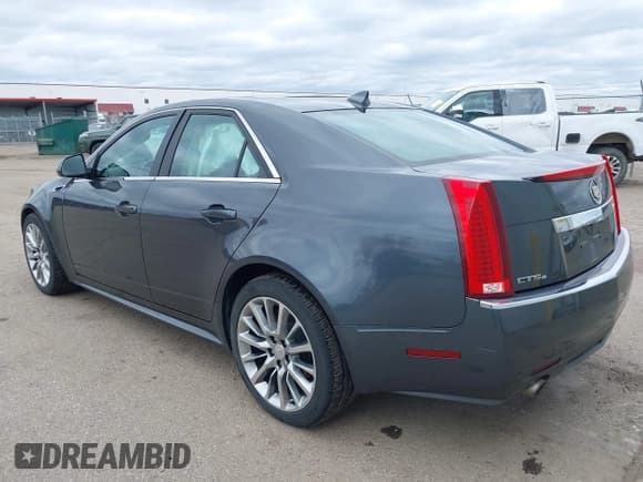✅ 2012 Cadillac CTS Luxury • VIN: 1G6DG5E51C0122078 • Lot: 42086692. Listed on IAAI with 125,231 mi. Free auction sales archive from the USA and detailed vehicle history report at DreamBid. Image 3.