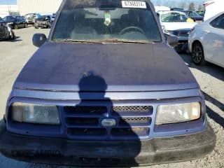 ✅ 1998 Chevrolet Tracker • VIN: 2CNBJ1863W6906496 • Лот: 87368314. Опубликован ранее на Copart с пробегом 144 557 миль. Бесплатный доступ к архиву аукционных продаж из США и подробный отчёт об истории автомобиля на DreamBid. Изображение 6.