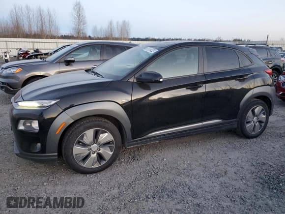 ✅ 2019 Hyundai Kona Limited • VIN: KM8K33AG5KU023827 • Лот: 38002944. Опубликован ранее на Copart с пробегом 49 105 миль. Бесплатный доступ к архиву аукционных продаж из США и подробный отчёт об истории автомобиля на DreamBid. Изображение 1.