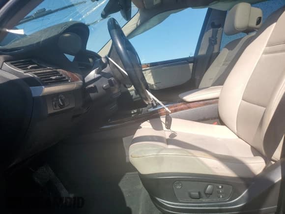 ✅ 2012 BMW X5 35i • VIN: 5UXZV4C57CL987933 • Lot: 63698065. Listed on Copart with Not provided. Free auction sales archive from the USA and detailed vehicle history report at DreamBid. Image 7.