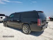 ✅ 2011 GMC Yukon XL Denali • VIN: 1GKS1MEFXBR299963 • Lot: 67390285. Listed on Copart with 295,610 mi. Free auction sales archive from the USA and detailed vehicle history report at DreamBid. Image 2.