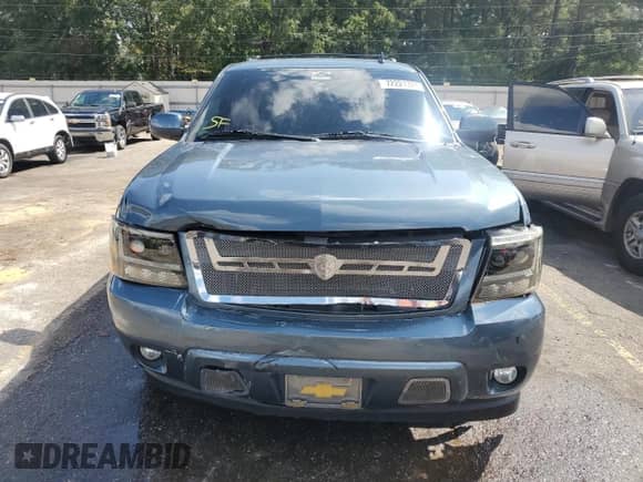 2008 Chevrolet Suburban LT с VIN 1GNFC16078J245227, выставлен на аукционе Copart как лот 72221724 с пробегом 169 519 миль миль и Списание • Salvage title. История ставок и продаж доступна на DreamBid. Изображение 5.