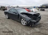 ✅ 2012 Dodge Challenger SXT • VIN: 2C3CDYAG7CH208795 • Lot: 86140684. Wystawiony na Copart z przebiegiem 58 937 mil. Bezpłatny archiwum sprzedaży aukcyjnych z USA i szczegółowy raport historii pojazdu na DreamBid. Zdjęcie 4.