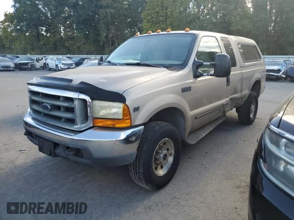 ✅ 1999 Ford F-250 XL • VIN: 1FTNX21L4XED28864 • Lot: 84868355. Listed on Copart with 389,986 mi. Free auction sales archive from the USA and detailed vehicle history report at DreamBid. Image 1.