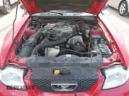 ✅ 1999 Ford Mustang • VIN: 1FAFP4047XF109522 • Lot: 42431256. Wystawiony na IAAI z przebiegiem 118 749 mil. Bezpłatny archiwum sprzedaży aukcyjnych z USA i szczegółowy raport historii pojazdu na DreamBid. Zdjęcie 10.