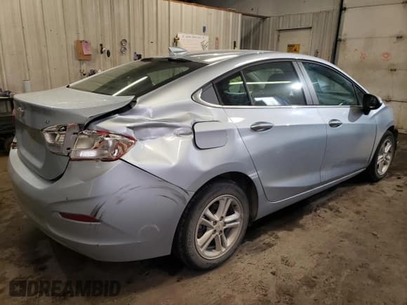 ✅ 2017 Chevrolet Cruze LT • VIN: 1G1BE5SM5H7205669 • Lot: 36700113. Listed on Copart with 7,809 mi. Free auction sales archive from the USA and detailed vehicle history report at DreamBid. Image 3.