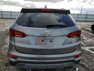 ✅ 2018 Hyundai Santa Fe Ultimate • VIN: 5NMZWDLAXJH105020 • Лот: 39339484. Опубликован ранее на Copart с пробегом 134 934 миль. Бесплатный доступ к архиву аукционных продаж из США и подробный отчёт об истории автомобиля на DreamBid. Изображение 6.