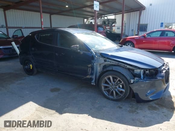 ✅ 2021 Mazda 3 Select • VIN: JM1BPBKL3M1402652 • Lot: 42208110. Listed on IAAI with 19,002 mi. Free auction sales archive from the USA and detailed vehicle history report at DreamBid. Image 1.