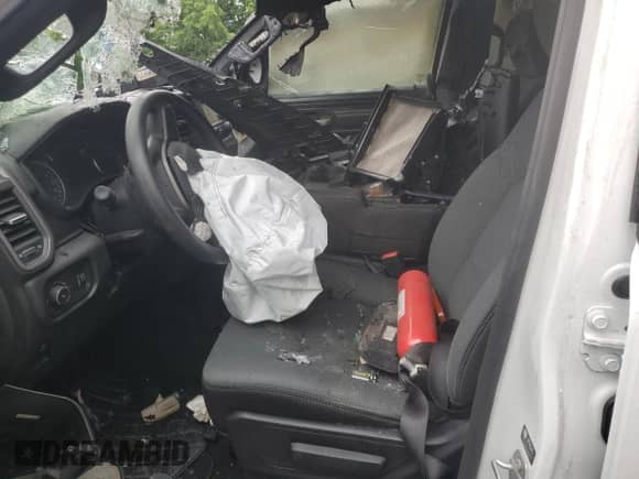 2023 Ram 1500 Tradesman z VIN 1C6RRENT1PN633382, wystawiony jako Copart lot #58935685 z przebiegiem Nie podano mil oraz Szkoda całkowita • Salvage title. Historia ofert i sprzedaży dostępna na DreamBid. Obrazek 7.