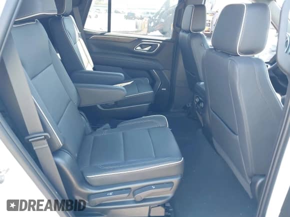 2023 Chevrolet Tahoe Premier z VIN 1GNSKSKD7PR196918, wystawiony jako IAAI lot #43356101 z przebiegiem 13 675 mil mil oraz . Historia ofert i sprzedaży dostępna na DreamBid. Obrazek 8.