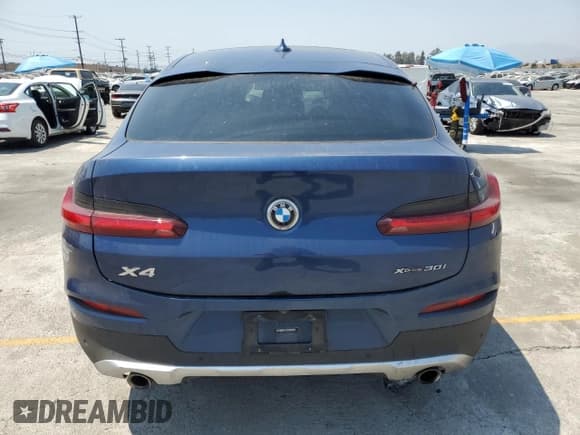 ✅ 2020 BMW X4 xDrive30i • VIN: 5UX2V1C09LLE67658 • Lot: 64857485. Wystawiony na Copart z przebiegiem 58 509 mil. Bezpłatny archiwum sprzedaży aukcyjnych z USA i szczegółowy raport historii pojazdu na DreamBid. Zdjęcie 6.