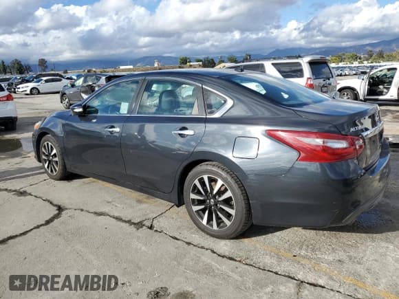 ✅ 2018 Nissan Altima SL • VIN: 1N4AL3AP7JC165073 • Lot: 86803345. Listed on Copart with 154,886 mi. Free auction sales archive from the USA and detailed vehicle history report at DreamBid. Image 2.