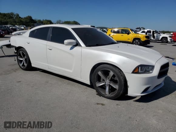✅ 2014 Dodge Charger Road/Track • VIN: 2C3CDXCT7EH221487 • Lot: 71080555. Listed on Copart with 133,045 mi. Free auction sales archive from the USA and detailed vehicle history report at DreamBid. Image 4.