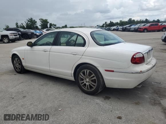 ✅ 2005 Jaguar S-Type • VIN: SAJWA01T65FN17454 • Lot: 80102065. Listed on Copart with 127,516 mi. Free auction sales archive from the USA and detailed vehicle history report at DreamBid. Image 2.