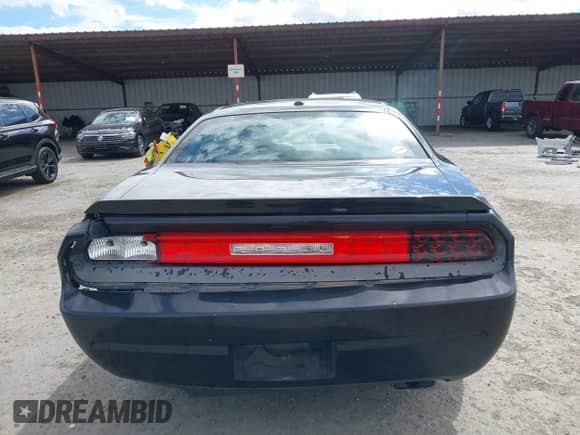 2014 Dodge Challenger R/T z VIN 2C3CDYBT6EH229572, wystawiony jako IAAI lot #43326778 z przebiegiem 125 314 mil mil oraz . Historia ofert i sprzedaży dostępna na DreamBid. Obrazek 16.